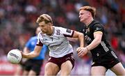 22 June 2025; Cian Hernon of Galway and Danny Magill of Down during the GAA Football All-Ireland Senior Championship preliminary quarter-final match between Down and Galway at Páirc Esler in Newry, Down. Photo by Ben McShane/Sportsfile