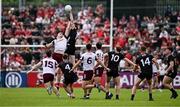 22 June 2025; Odhran Murdock of Down and Matthew Tierney of Galway contest a high-ball during the GAA Football All-Ireland Senior Championship preliminary quarter-final match between Down and Galway at Páirc Esler in Newry, Down. Photo by Ben McShane/Sportsfile