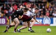 22 June 2025; Cein Darcy of Galway in action against Pat Havern, behind and Peter Fegan of Down during the GAA Football All-Ireland Senior Championship preliminary quarter-final match between Down and Galway at Páirc Esler in Newry, Down. Photo by Ben McShane/Sportsfile
