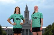 24 June 2025; Republic of Ireland's Kyra Carusa, left and goalkeeper Courtney Brosnan pose for a photograph in front of the Denver City & County Building, ahead of their international friendly match against United States at Dick’s Sporting Goods Park in Colorado, USA, on Thursday. Photo by Stephen McCarthy/Sportsfile