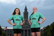 24 June 2025; Republic of Ireland's Kyra Carusa, left and goalkeeper Courtney Brosnan pose for a photograph in front of the Denver City & County Building, ahead of their international friendly match against United States at Dick’s Sporting Goods Park in Colorado, USA, on Thursday. Photo by Stephen McCarthy/Sportsfile