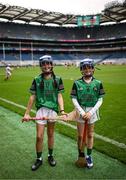 24 June 2025; Players from the Daingean Uí Chúis, Dingle, Kerry, team puts on their helmet at the GAAgaeilge Go Games at Croke Park in Dublin. Photo by Ramsey Cardy/Sportsfile