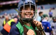 24 June 2025; A player from the Daingean Uí Chúis, Dingle, Kerry, team puts on their helmet at the GAAgaeilge Go Games at Croke Park in Dublin. Photo by Ramsey Cardy/Sportsfile