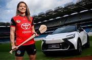 26 June 2025; Pictured pitch side in Croke Park at today’s launch of Toyota Ireland as the new Official Car Partner to The Camogie Association is Dublin Camogie captain and Toyota ambassador Aisling Maher with the Toyota C-HR Hybrid. Under this new three-year agreement, Toyota becomes the Official Car Partner to these sporting organisations and reflects Toyota’s continued commitment to supporting Irish sport and communities across the country. Photo by Seb Daly/Sportsfile