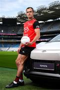 26 June 2025; Pictured pitch side in Croke Park at today’s launch of Toyota Ireland as the new Official Car Partner to The Camogie Association is Galway footballer and Toyota ambassador John Maher with the Toyota C-HR Hybrid. Under this new three-year agreement, Toyota becomes the Official Car Partner to these sporting organisations and reflects Toyota’s continued commitment to supporting Irish sport and communities across the country. Photo by Seb Daly/Sportsfile