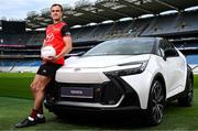 26 June 2025; Pictured pitch side in Croke Park at today’s launch of Toyota Ireland as the new Official Car Partner to The Camogie Association is Galway footballer and Toyota ambassador John Maher with the Toyota C-HR Hybrid. Under this new three-year agreement, Toyota becomes the Official Car Partner to these sporting organisations and reflects Toyota’s continued commitment to supporting Irish sport and communities across the country. Photo by Seb Daly/Sportsfile