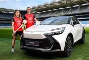 26 June 2025; Pictured pitch side in Croke Park at today’s launch of Toyota Ireland as the new Official Car Partner to The Camogie Association are Galway footballer and Toyota ambassador John Maher and Dublin Camogie captain and Toyota ambassador Aisling Maher with the Toyota C-HR Hybrid. Under this new three-year agreement, Toyota becomes the Official Car Partner to these sporting organisations and reflects Toyota’s continued commitment to supporting Irish sport and communities across the country. Photo by Seb Daly/Sportsfile