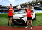 26 June 2025; Pictured pitch side in Croke Park at today’s launch of Toyota Ireland as the new Official Car Partner to The Camogie Association are Galway footballer and Toyota ambassador John Maher and Dublin Camogie captain and Toyota ambassador Aisling Maher with the Toyota C-HR Hybrid. Under this new three-year agreement, Toyota becomes the Official Car Partner to these sporting organisations and reflects Toyota’s continued commitment to supporting Irish sport and communities across the country. Photo by Seb Daly/Sportsfile