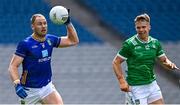 22 June 2025; Dean Healy of Wicklow in action against Cillian Fahy of Limerick during the Tailteann Cup semi-final match between Wicklow and Limerick at Croke Park in Dublin. Photo by Piaras Ó Mídheach/Sportsfile