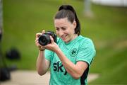 25 June 2025; Lucy Quinn takes a photograph during a Republic of Ireland women training session at North Area Athletic Complex in Arvada, Colorado, USA. Photo by Stephen McCarthy/Sportsfile