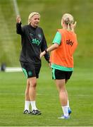 25 June 2025; Head coach Carla Ward and Izzy Atkinson during a Republic of Ireland women training session at North Area Athletic Complex in Arvada, Colorado, USA. Photo by Stephen McCarthy/Sportsfile