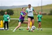 25 June 2025; Saoirse Noonan is tackled by Anna Patten during a Republic of Ireland women training session at North Area Athletic Complex in Arvada, Colorado, USA. Photo by Stephen McCarthy/Sportsfile