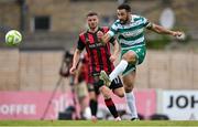 23 June 2025; Roberto Lopes of Shamrock Rovers in action against Adam McDonnell of Bohemians during the SSE Airtricity Men's Premier Division match between Bohemians and Shamrock Rovers at Dalymount Park in Dublin. Photo by Shauna Clinton/Sportsfile