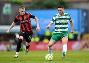 23 June 2025; Dylan Watts of Shamrock Rovers in action against Ross Tierney of Bohemians during the SSE Airtricity Men's Premier Division match between Bohemians and Shamrock Rovers at Dalymount Park in Dublin. Photo by Shauna Clinton/Sportsfile