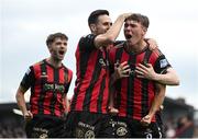 23 June 2025; Dayle Rooney of Bohemians, right, celebrates with team-mates after scoring his side's first goal during the SSE Airtricity Men's Premier Division match between Bohemians and Shamrock Rovers at Dalymount Park in Dublin. Photo by Shauna Clinton/Sportsfile
