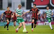 23 June 2025; Michael Noonan of Shamrock Rovers in action against Liam Smith of Bohemians during the SSE Airtricity Men's Premier Division match between Bohemians and Shamrock Rovers at Dalymount Park in Dublin. Photo by Shauna Clinton/Sportsfile