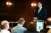 25 July 2025; Minister of State at the Department of Culture, Communications and Sport Charlie McConalogue TD speaking the Olympic Federation of Ireland AGM at The Alex Hotel in Dublin. Photo by Seb Daly/Sportsfile