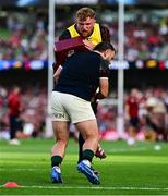 20 June 2025; Ollie Chessum, left, and Ellis Genge of British & Irish Lions warm up before the Lions 1888 Cup match between the British & Irish Lions and Argentina at the Aviva Stadium in Dublin. Photo by Brendan Moran/Sportsfile