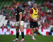 20 June 2025; British & Irish Lions assistant coach Jonathan Sexton, right, watches Fin Smith before the Lions 1888 Cup match between the British & Irish Lions and Argentina at the Aviva Stadium in Dublin. Photo by Brendan Moran/Sportsfile