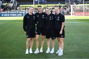 26 June 2025; Republic of Ireland players, from left, Kyra Carusa, Erin Healy, Abbie Larkin and Sophie Whitehouse before the women's international friendly match between the USA and Republic of Ireland at Dick’s Sporting Goods Park in Commerce City, Colorado, USA. Photo by Stephen McCarthy/Sportsfile
