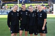 26 June 2025; Republic of Ireland players, from left, Kyra Carusa, Erin Healy, Abbie Larkin and Sophie Whitehouse before the women's international friendly match between the USA and Republic of Ireland at Dick’s Sporting Goods Park in Commerce City, Colorado, USA. Photo by Stephen McCarthy/Sportsfile
