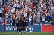 26 June 2025; United States players celebrate their first goal, scored by Avery Patterson, hidden, during the women's international friendly match between the USA and Republic of Ireland at Dick’s Sporting Goods Park in Commerce City, Colorado, USA. Photo by Stephen McCarthy/Sportsfile