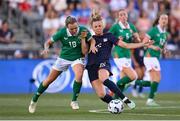 26 June 2025; Claire Hutton of United States in action against Kyra Carusa of Republic of Ireland during the women's international friendly match between the USA and Republic of Ireland at Dick’s Sporting Goods Park in Commerce City, Colorado, USA. Photo by Stephen McCarthy/Sportsfile
