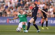 26 June 2025; Rose Lavelle of United States is tackled by Kyra Carusa of Republic of Ireland during the women's international friendly match between the USA and Republic of Ireland at Dick’s Sporting Goods Park in Commerce City, Colorado, USA. Photo by Stephen McCarthy/Sportsfile