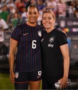 26 June 2025; Denise O’Sullivan of Republic of Ireland with Lynn Biyendolo of United States after the women's international friendly match between the USA and Republic of Ireland at Dick’s Sporting Goods Park in Commerce City, Colorado, USA. Photo by Stephen McCarthy/Sportsfile