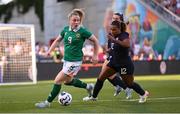 26 June 2025; Amber Barrett of Republic of Ireland and Michelle Cooper of United States during the women's international friendly match between the USA and Republic of Ireland at Dick’s Sporting Goods Park in Commerce City, Colorado, USA. Photo by Stephen McCarthy/Sportsfile