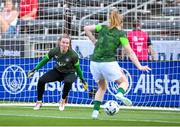 26 June 2025; Republic of Ireland goalkeeper Courtney Brosnan and Amber Barrett during the warm-up before the women's international friendly match between the USA and Republic of Ireland at Dick’s Sporting Goods Park in Commerce City, Colorado, USA. Photo by Stephen McCarthy/Sportsfile