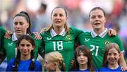 26 June 2025; Republic of Ireland players, from left, Lucy Quinn, Kyra Carusa and Emily Murphy stand for the playing of the National Anthem before the women's international friendly match between the USA and Republic of Ireland at Dick’s Sporting Goods Park in Commerce City, Colorado, USA. Photo by Stephen McCarthy/Sportsfile
