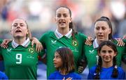 26 June 2025; Republic of Ireland players, from left, Amber Barrett, Anna Patten and Lucy Quinn stand for the playing of the National Anthem before the women's international friendly match between the USA and Republic of Ireland at Dick’s Sporting Goods Park in Commerce City, Colorado, USA. Photo by Stephen McCarthy/Sportsfile