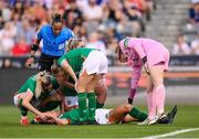 26 June 2025; Caitlin Hayes of Republic of Ireland is checked on by team-mates Megan Connolly, Jessie Stapleton, Ruesha Littlejohn, goalkeeper Courtney Brosnan and referee Vimarest Diaz during the women's international friendly match between the USA and Republic of Ireland at Dick’s Sporting Goods Park in Commerce City, Colorado, USA. Photo by Stephen McCarthy/Sportsfile