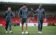 27 June 2025; Drogheda United players, including Luke Heeney, right, walk the pitch before the SSE Airtricity Men's Premier Division match between Derry City and Drogheda United at The Ryan McBride Brandywell Stadium in Derry. Photo by Shauna Clinton/Sportsfile