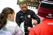 27 June 2025; Derry City manager Tiernan Lynch signs autographs for supporters before the SSE Airtricity Men's Premier Division match between Derry City and Drogheda United at The Ryan McBride Brandywell Stadium in Derry. Photo by Shauna Clinton/Sportsfile
