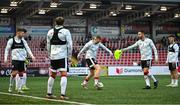 27 June 2025; Shane Ferguson of Derry City, centre, and team-mates warm-up before the SSE Airtricity Men's Premier Division match between Derry City and Drogheda United at The Ryan McBride Brandywell Stadium in Derry. Photo by Shauna Clinton/Sportsfile