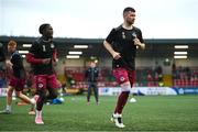 27 June 2025; Drogheda United players, including Ryan Brennan, right, warm-up before the SSE Airtricity Men's Premier Division match between Derry City and Drogheda United at The Ryan McBride Brandywell Stadium in Derry. Photo by Shauna Clinton/Sportsfile