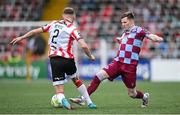27 June 2025; Conor Kane of Drogheda United in action against Ronan Boyce of Derry City during the SSE Airtricity Men's Premier Division match between Derry City and Drogheda United at The Ryan McBride Brandywell Stadium in Derry. Photo by Shauna Clinton/Sportsfile