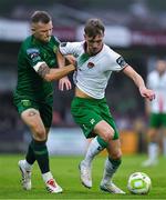 27 June 2025; Alex Nolan of Cork City is tackled by Jamie Lennon of St Patrick's Athletic during the SSE Airtricity Men's Premier Division match between Cork City and St Patrick's Athletic at Turner's Cross in Cork. Photo by Brendan Moran/Sportsfile