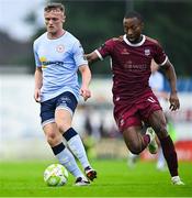 27 June 2025; JJ Lunney of Shelbourne in action against Malcolm Shaw of Galway United during the SSE Airtricity Men's Premier Division match between Galway United and Shelbourne at Eamonn Deacy Park in Galway. Photo by Piaras Ó Mídheach/Sportsfile