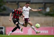 27 June 2025; Ross Tierney of Bohemians in action against Kyle McDonagh of Sligo Rovers during the SSE Airtricity Men's Premier Division match between Bohemians and Sligo Rovers at Dalymount Park in Dublin. Photo by Seb Daly/Sportsfile