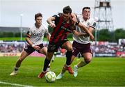 27 June 2025; Dayle Rooney of Bohemians in action against Reece Hutchinson of Sligo Rovers during the SSE Airtricity Men's Premier Division match between Bohemians and Sligo Rovers at Dalymount Park in Dublin. Photo by Seb Daly/Sportsfile