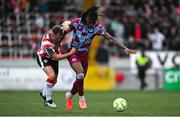 27 June 2025; Aaron Harper-Bailey of Drogheda United in action against Gavin Whyte of Derry City during the SSE Airtricity Men's Premier Division match between Derry City and Drogheda United at The Ryan McBride Brandywell Stadium in Derry. Photo by Shauna Clinton/Sportsfile