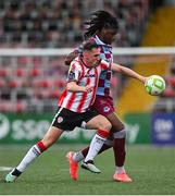 27 June 2025; Aaron Harper-Bailey of Drogheda United in action against Gavin Whyte of Derry City during the SSE Airtricity Men's Premier Division match between Derry City and Drogheda United at The Ryan McBride Brandywell Stadium in Derry. Photo by Shauna Clinton/Sportsfile