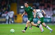 27 June 2025; Axel Sjoberg of St Patrick's Athletic in action against Kitt Nelson of Cork City during the SSE Airtricity Men's Premier Division match between Cork City and St Patrick's Athletic at Turner's Cross in Cork. Photo by Brendan Moran/Sportsfile