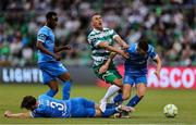 27 June 2025; Graham Burke of Shamrock Rovers is tackled by Waterford players Ryan Burke, 3, and Darragh Leahy, right, during the SSE Airtricity Men's Premier Division match between Shamrock Rovers and Waterford at Tallaght Stadium in Dublin. Photo by Thomas Flinkow/Sportsfile