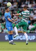 27 June 2025; Padraig Amond of Waterford in action against Graham Burke of Shamrock Rovers during the SSE Airtricity Men's Premier Division match between Shamrock Rovers and Waterford at Tallaght Stadium in Dublin. Photo by Thomas Flinkow/Sportsfile