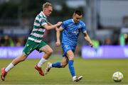 27 June 2025; Darragh Leahy of Waterford in action against Michael Noonan of Shamrock Rovers during the SSE Airtricity Men's Premier Division match between Shamrock Rovers and Waterford at Tallaght Stadium in Dublin. Photo by Thomas Flinkow/Sportsfile