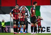 27 June 2025; Adam McDonnell of Bohemians, centre, and teammates Dawson Devoy, left, and Jordan Flores during the SSE Airtricity Men's Premier Division match between Bohemians and Sligo Rovers at Dalymount Park in Dublin. Photo by Seb Daly/Sportsfile